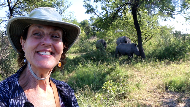 Elaine observing rhinos at extremely close quarters on foot